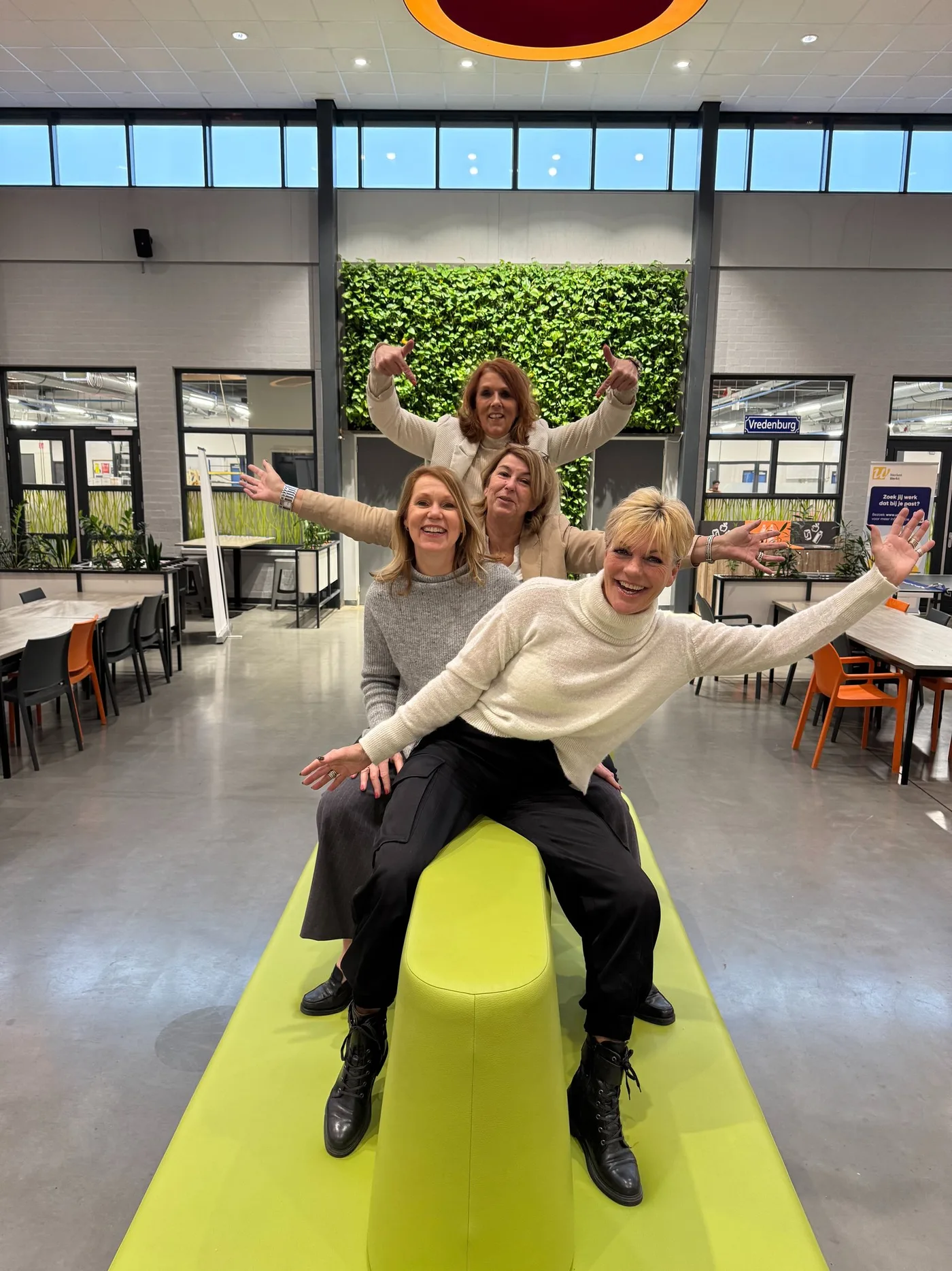 Het team van Hofclub in het werkcafé